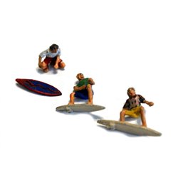 3 Surfers, 2 in riding positions and one waxing board. - Unpainted