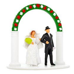 Bride and Groom with Wedding Arch