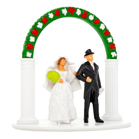 Bride and Groom with Wedding Arch