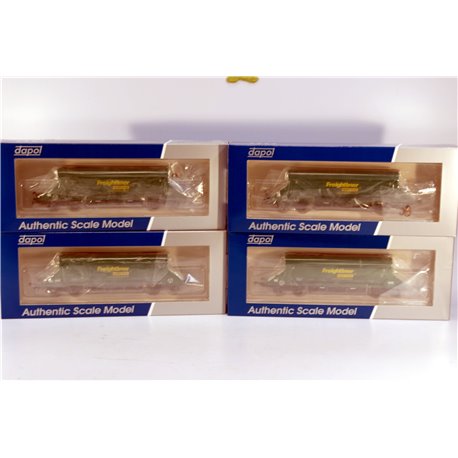 Set of Four HIA aggregate limestone hoppers in Freightliner green livery. Used. OO Gauge 