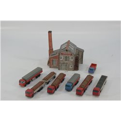 A Completed Metcalfe Kits of a Factory and a selection of painted diecast Lorries . Used. N Gauge