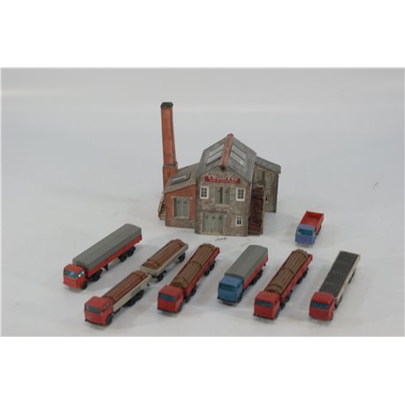 A Completed Metcalfe Kits of a Factory and a selection of painted diecast Lorries . Used. N Gauge
