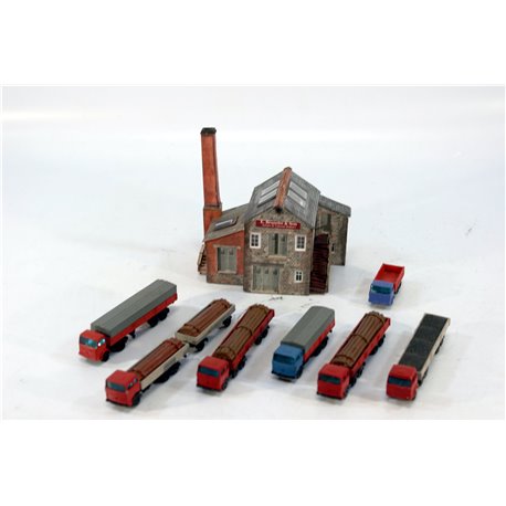 A Completed Metcalfe Kits of a Factory and a selection of painted diecast Lorries . Used. N Gauge