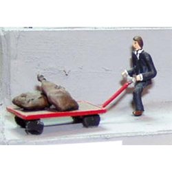 00 gauge figure of a porter with mail trolley and mail bags. 